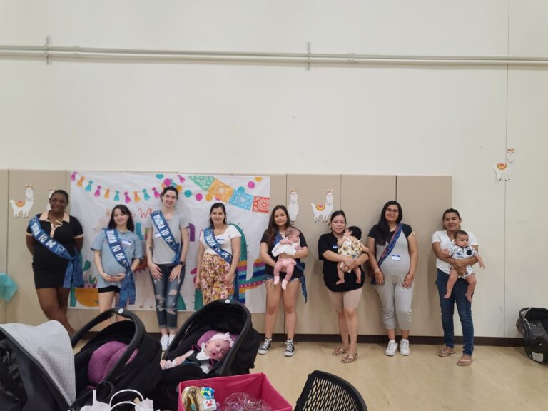 young women at a community baby shower for Two Lives Changed.